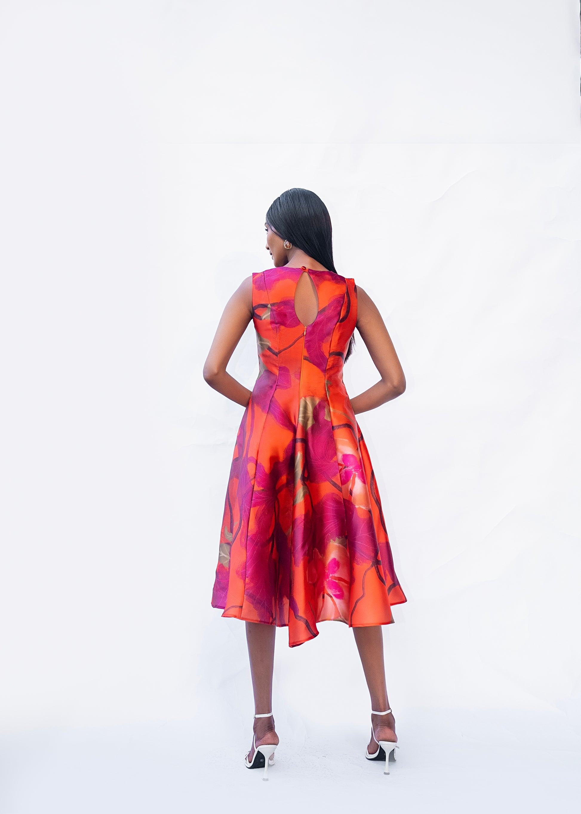 Orange midi flowy dress with back zip and fully lined finish