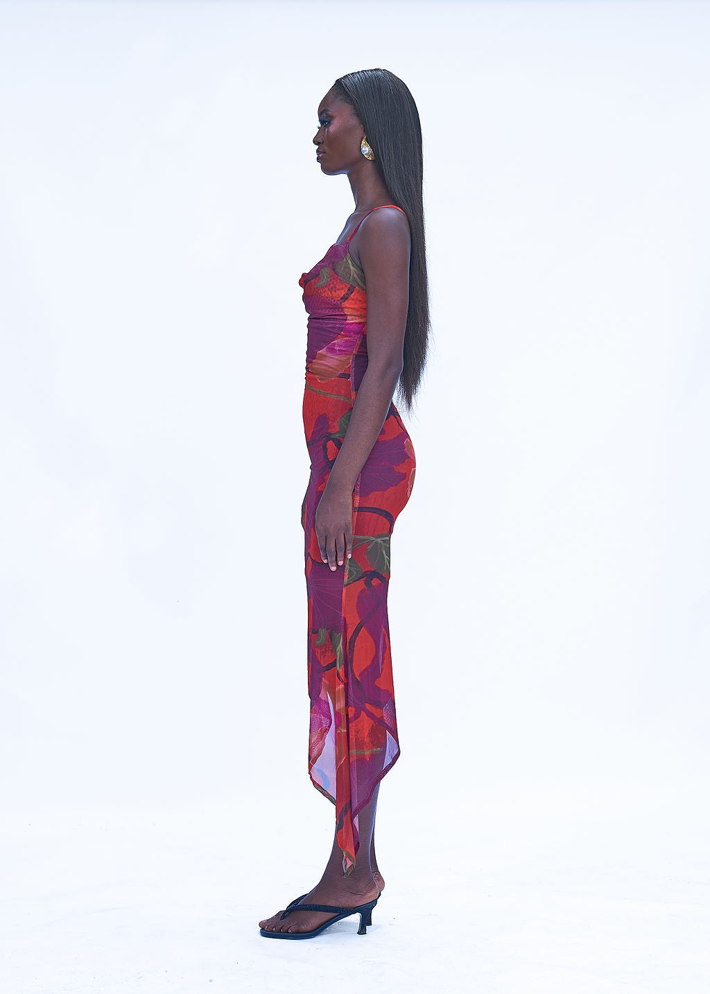 Bodycon mesh gown with draped neckline and asymmetric hem