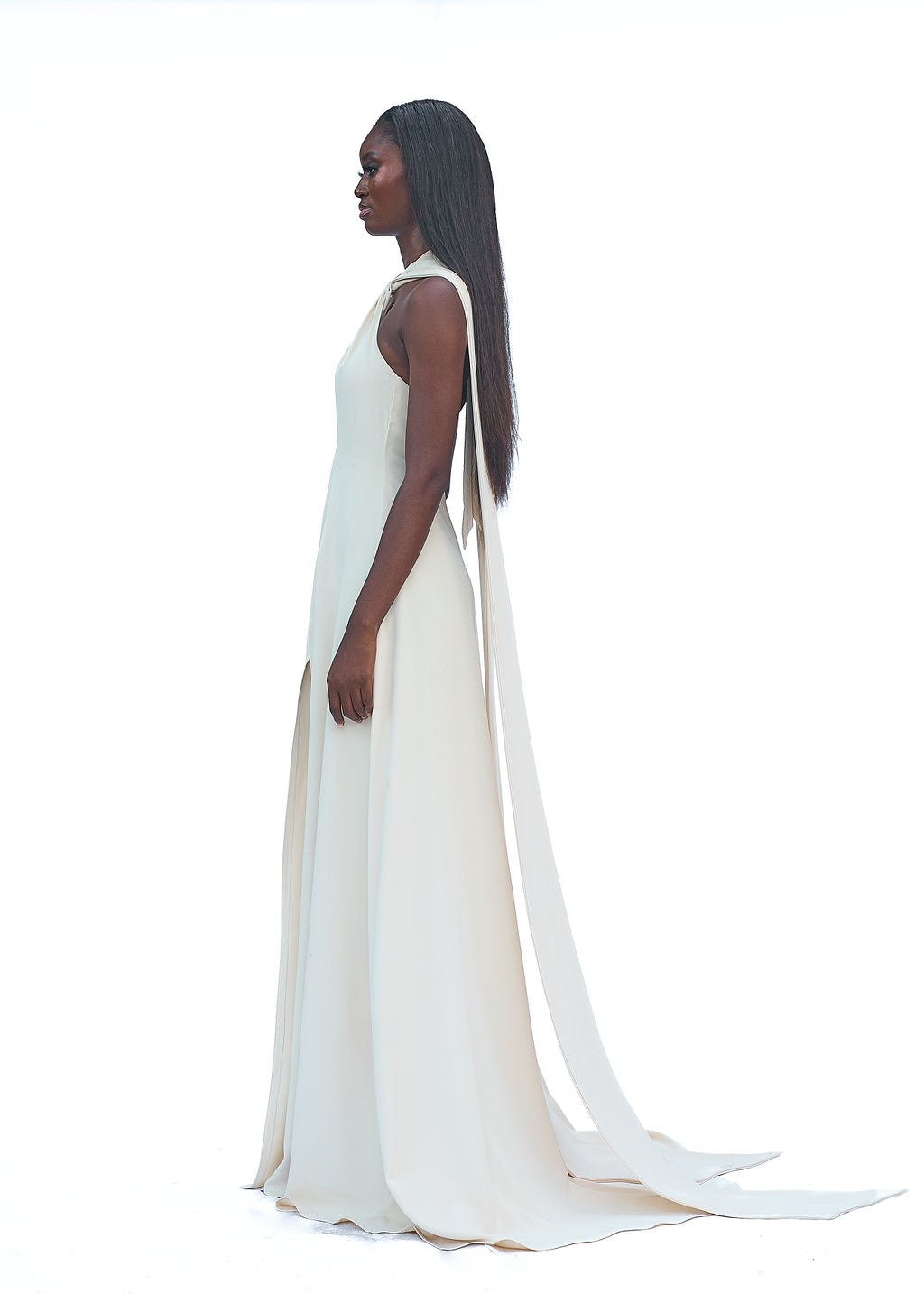 Cream halter evening gown with high slit and long train